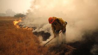 California firefighter tackles blaze