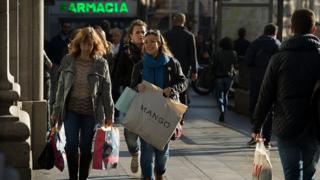 Shoppers in Spain