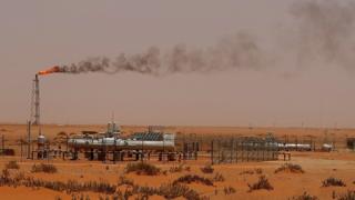 A flame from a Saudi Aramco oil installation in the desert east of the Saudi capital Riyadh, on 23 June 2008