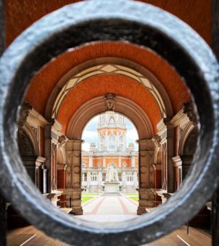 A building seen through a gate