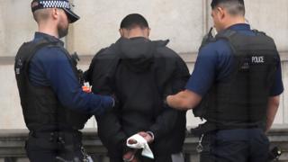 The suspect held by police in Westminster
