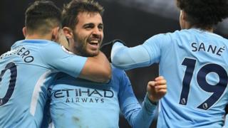 Manchester City players celebrate