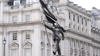 Banksy's signature appears on new statue in central London