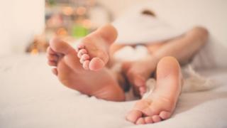 Pareja en la cama