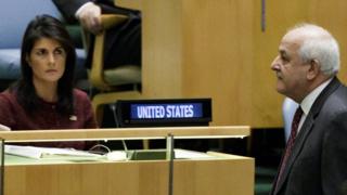 Riyad Mansour (R), the Palestinian Permanent Observer to the United Nations, walks past US permanent representative Nikki Haley (L) as the General Assembly gathers in New York on 21 December 2017