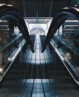Mirrored view up escalators