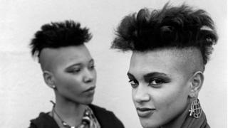 Two women in the 80s with buzzcuts