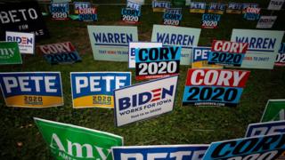 Signs for many of the Democratic Party presidential candidates at the Polk County Steak Fry
