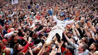 Lewis Hamilton won at Silverstone four years in a row from 2014, and celebrated in 2016 by crowd surfing
