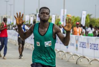 Man holding his arms up