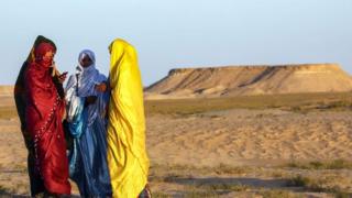 Tuareg women attend a traditional ceremony in the Libyan desert in the western Awal region near the borders with Tunisia and Algeria, about 600km (373 miles) southwest of the capital, Tripoli, on 29 March 2019