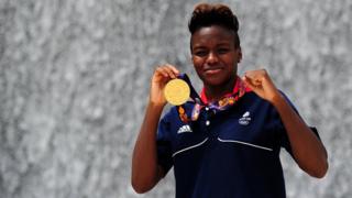 Nicola Adams holding medal