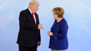 German Chancellor Angela Merkel receives U.S. President Donald Trump in the Hotel Atlantic, on the eve of the G20 summit, for bilateral talks on July 6, 2017 in Hamburg, Germany.