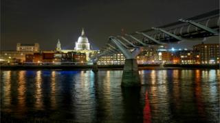 Millennium Bridge in London at night