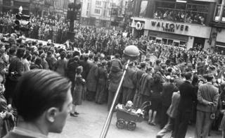 A microphone picks up sound of the crowd at the Victory Parade