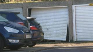The shooting took place at a block of garages