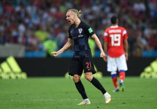   Croatian defender Dagogu Vida celebrates the goal of his cape Andrei Kramarich at the Russian gate 