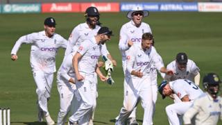 England celebrate a wicket