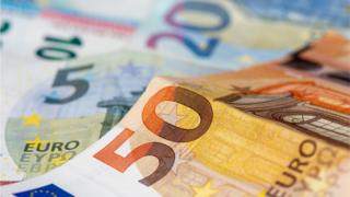 Euro banknotes and coins background