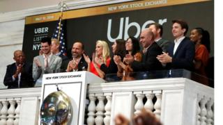 Uber shares sink on stock market debut