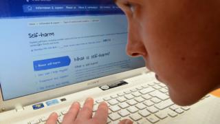 A man searches for advice on 'self-harm' online