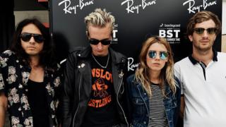 Models wearing Ray Ban sunglasses