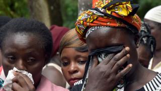 Family members react after looking at the bodies of the children killed in a stampede at the Kakamega Primary School, at the Kakamega County General Teaching Referral Hospital in Kakamega, Kenya February 4, 2020.