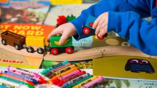 Child playing with toys