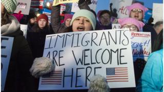 Demonstrators protest against US President Donald Trump