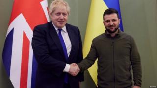 UK Prime Minister Boris Johnson shakes hands with Ukrainian President Volodymyr Zelensky in Kyiv