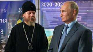 Путин и Тихон