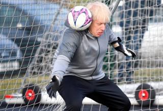 in_pictures Prime Minister Boris Johnson tried to save a shot whilst in a football goal