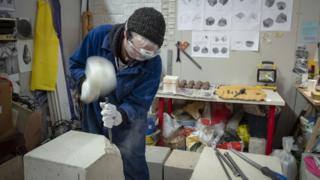 Sculptor Henrietta Armstrong at work in her studio at SET