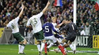 William Gallas scores for France against the Republic of Ireland after an apparent hand-ball from his teammate Thierry Henry.