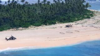 An Australian army helicopter lands on Pikelot Island in Micronesia
