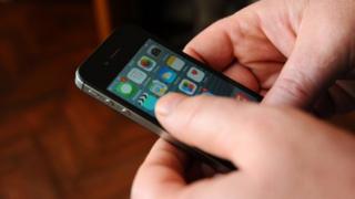 Man using smartphone