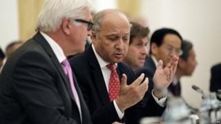 French Foreign Minister Laurent Fabius talks to German Foreign Minister Frank-Walter Steinmeier in Vienna. 10 July 2015