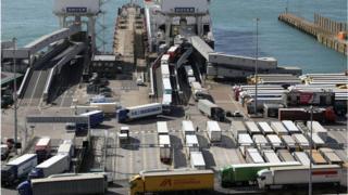 Lorries arrive and depart from the Dover Ferry Terminal