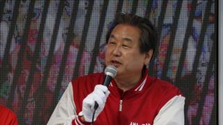 Kim Moo-sung, Chairman of the ruling Saenuri Party, speaks during a rally for the April 13 parliamentary elections in Seoul, South Korea, April 12, 2016.