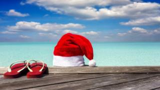 Santa hat and flip-flops