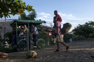 Migrants take a bicycle in southern Mexico