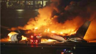 A Japan Airline (JAL) passenger plane bursts into flames on the tarmac at Haneda Airport in Tokyo, Japan, 02 January 2024, after its landing.