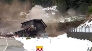 Hut swept away by Japan landslide