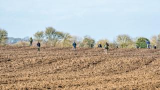 Metal detectorists in Shifford
