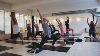 People take classes at Peckham Levels' yoga studio