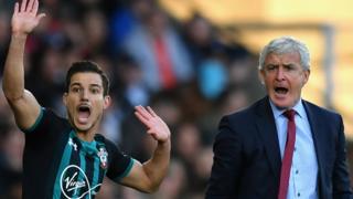 Mark Hughes and Cedric Soares
