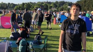 Our reporter Will in the queue