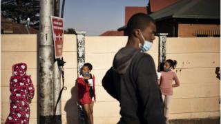 People wear masks in South Africa