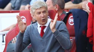 Arsene Wenger celebrates one of his team's goals