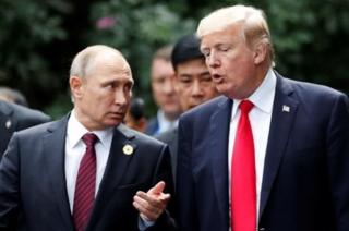 Presiden Rusia Vladimir Putin dan Presiden Amerika Donald Trump
